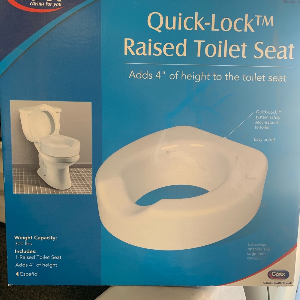 Raised toilet seat